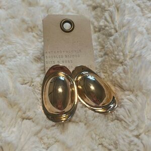 Brand new Anthropologie earrings. Gold, round comfortable earrings.